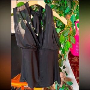White House Black Market Black Blouse
Elegant Design